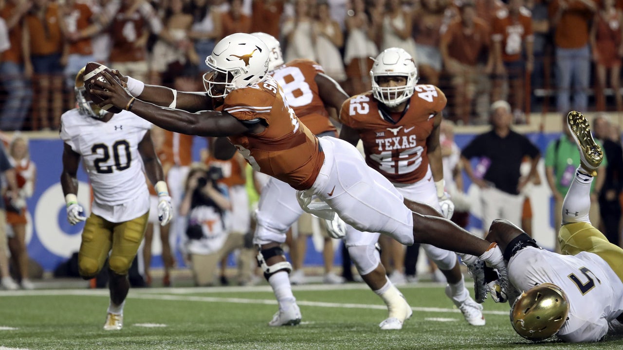 Texas' faith in Charlie Strong is rewarded with stunning upset of Notre Dame